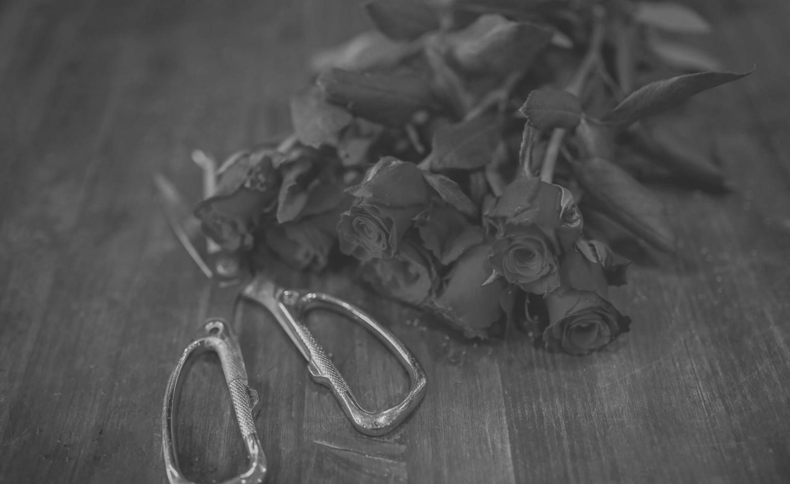 Students working on floral arrangements during hands-on workshop session