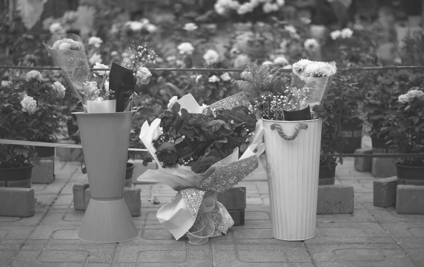 Variety of seasonal flowers and foliage arrangements